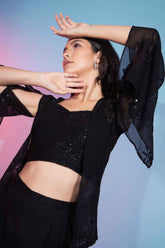 Ensemble de cordons brodés en georgette noire à paillettes avec haussement d'épaules